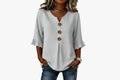 Laura | Blusa de lino con volantes y botones
