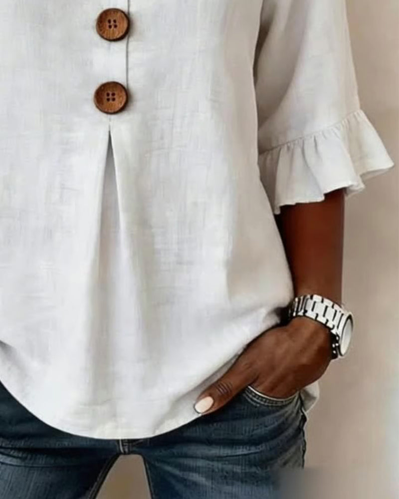 Laura | Blusa de lino con volantes y botones