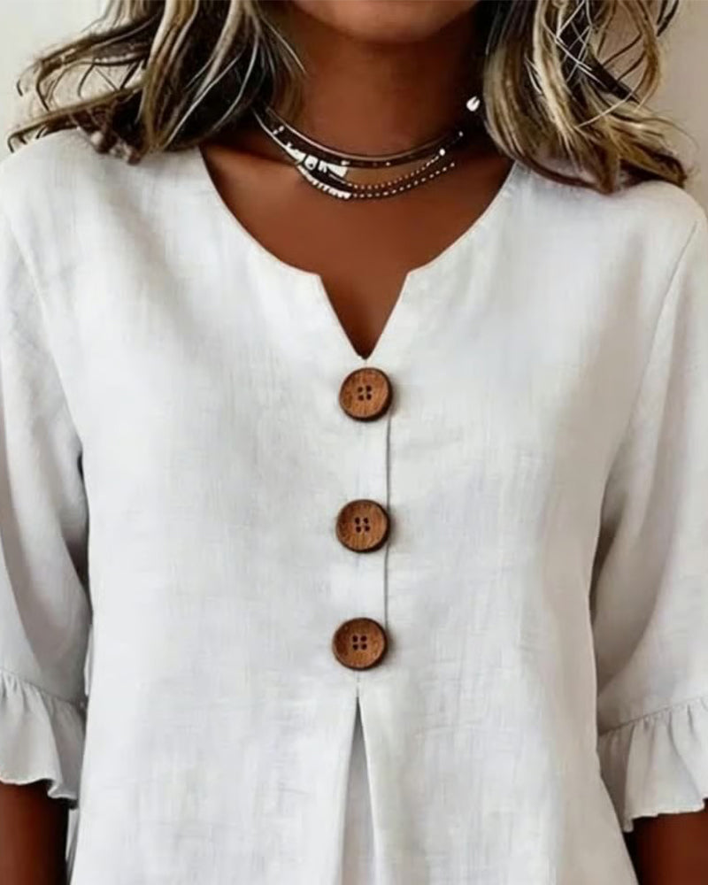 Laura | Blusa de lino con volantes y botones