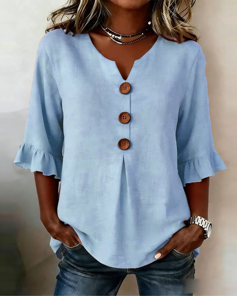 Laura | Blusa de lino con volantes y botones