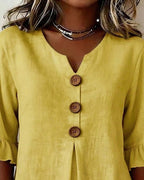 Laura | Blusa de lino con volantes y botones