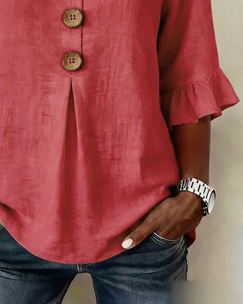 Laura | Blusa de lino con volantes y botones