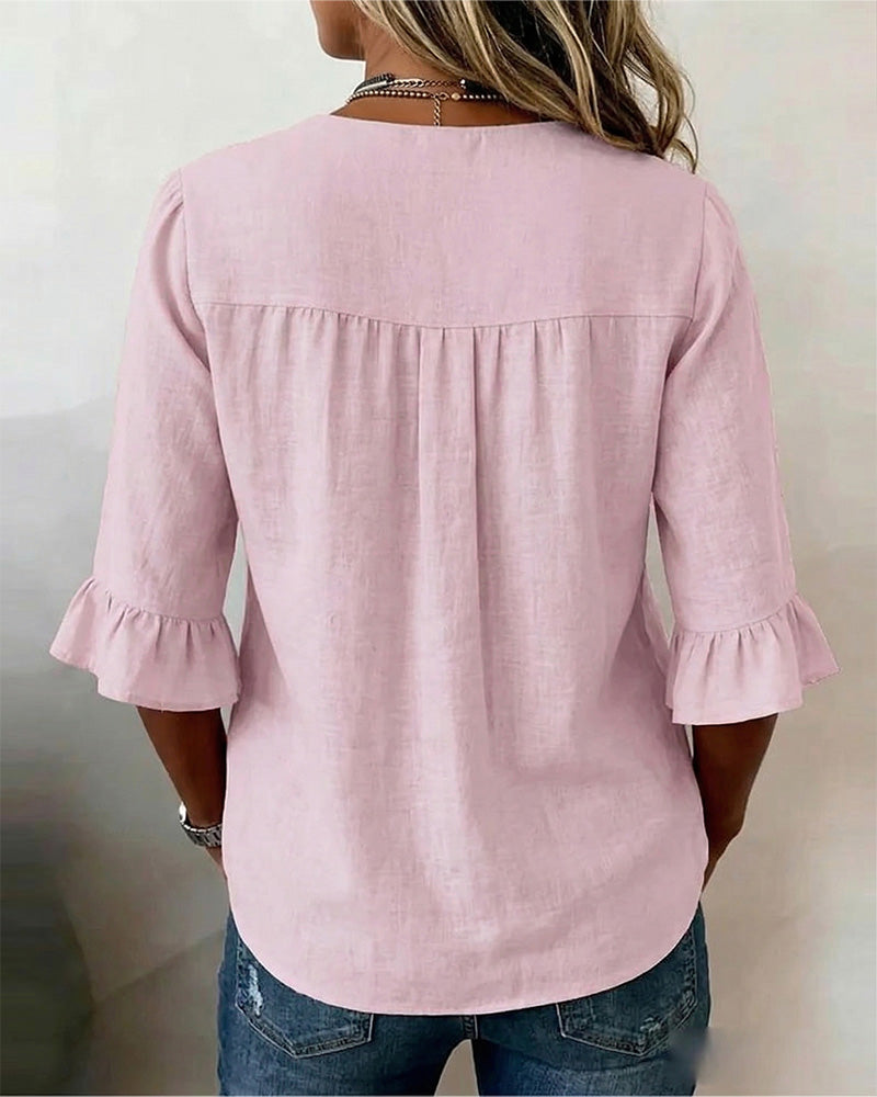 Laura | Blusa de lino con volantes y botones