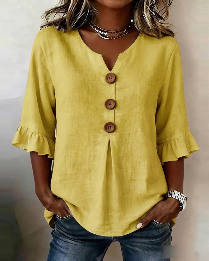 Laura | Blusa de lino con volantes y botones