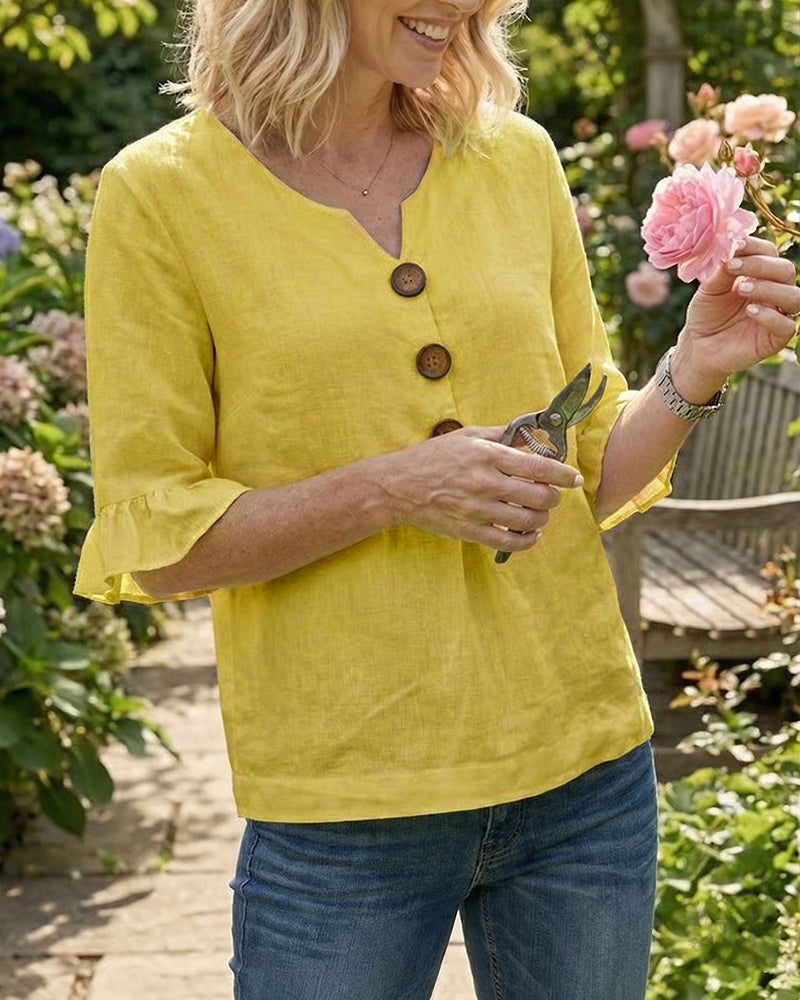Laura | Blusa de lino con volantes y botones